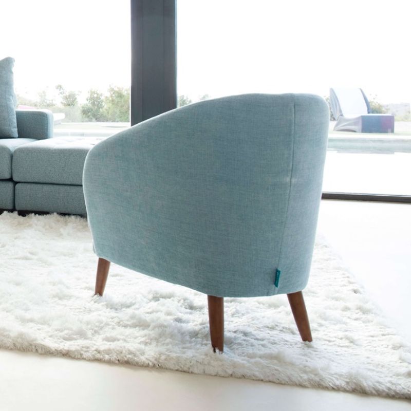 Komba armchair on legs from Fama