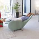 Blue swivel chair reclined